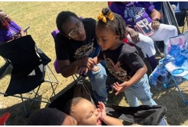 Church community members sharing time together outdoors